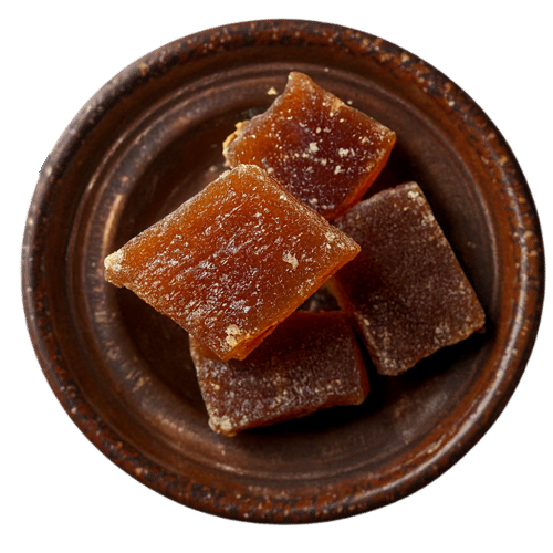 Vedafox premium sweet jaggery in rustic pieces and powder form, showing golden-brown color, natural texture, and traditional unrefined quality.